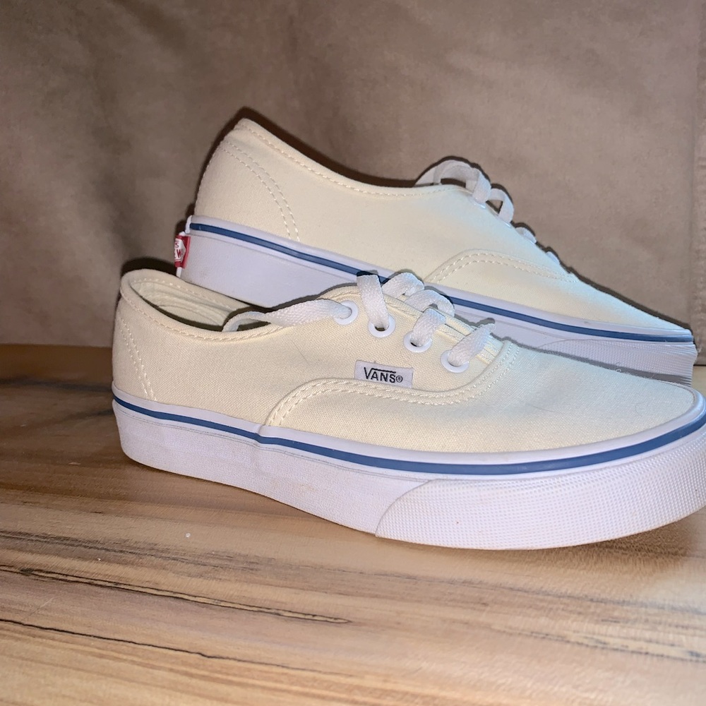 Light/baby yellow with blue accent vans